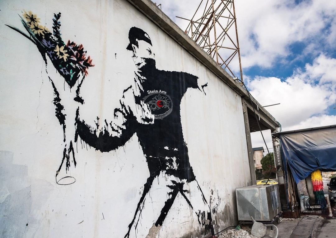 Liebe liegt in der Luft von Banksy